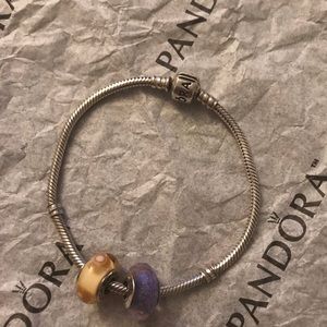 Authentic pandora bracelet with 2 charms